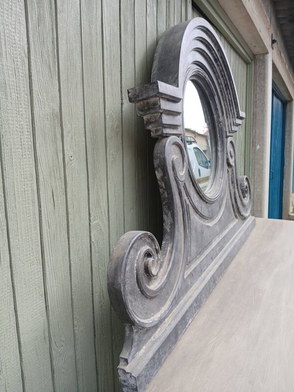 Miroir en bois forme œil de boeuf