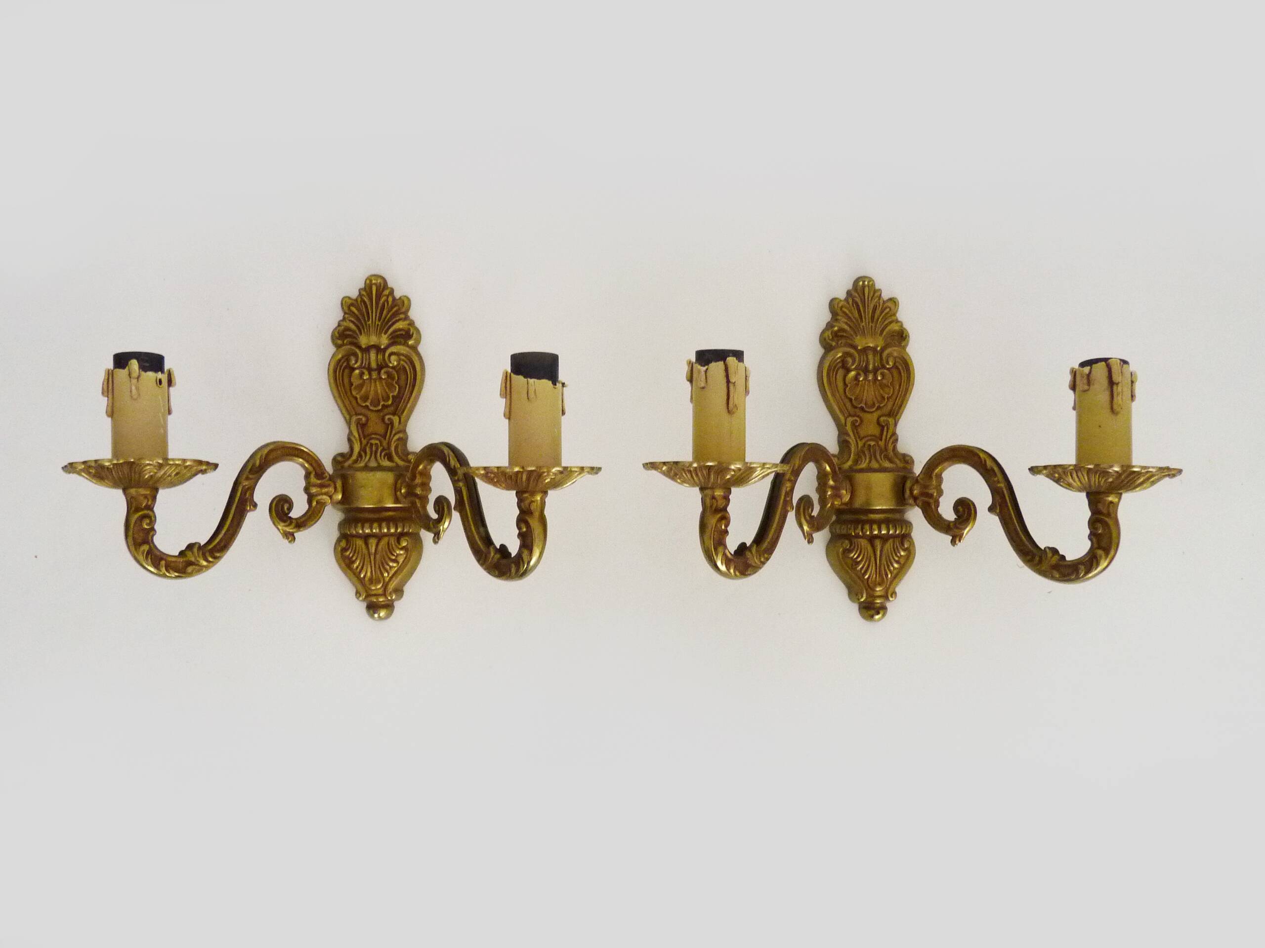 Old pair of double-light brass wall sconces. 60s