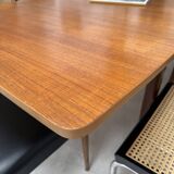 Extendable teak dining table