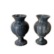 Pair of black serpentine marble vase-urns, early 20th century, Empire style