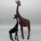 2 girafes en bois sculpté
