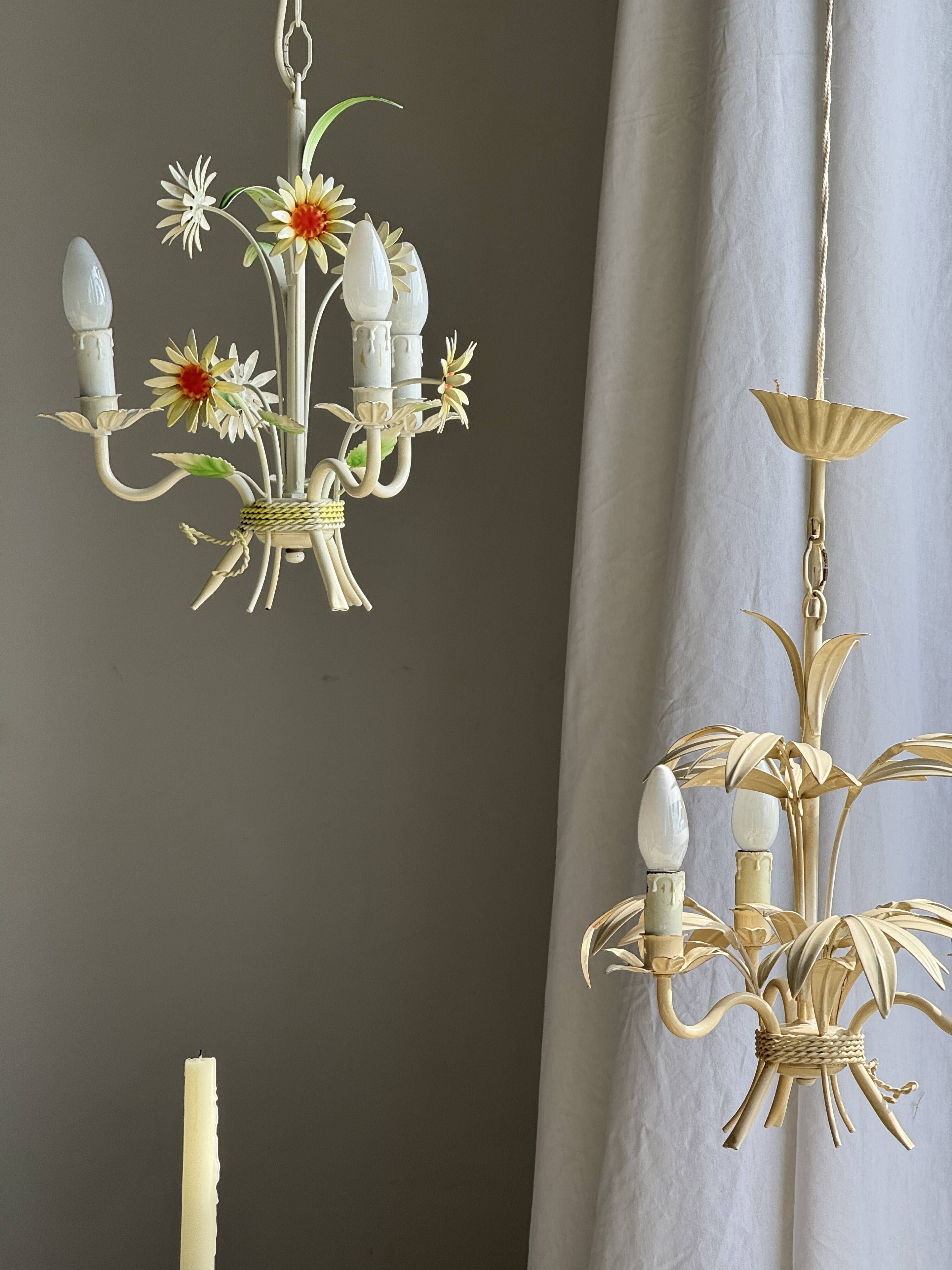 Small vintage cream metal flower chandelier with orange flowers and 3 arms.