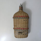 Ancient pilgrim's gourd in rattan lourdes