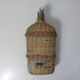 Ancient pilgrim's gourd in rattan lourdes