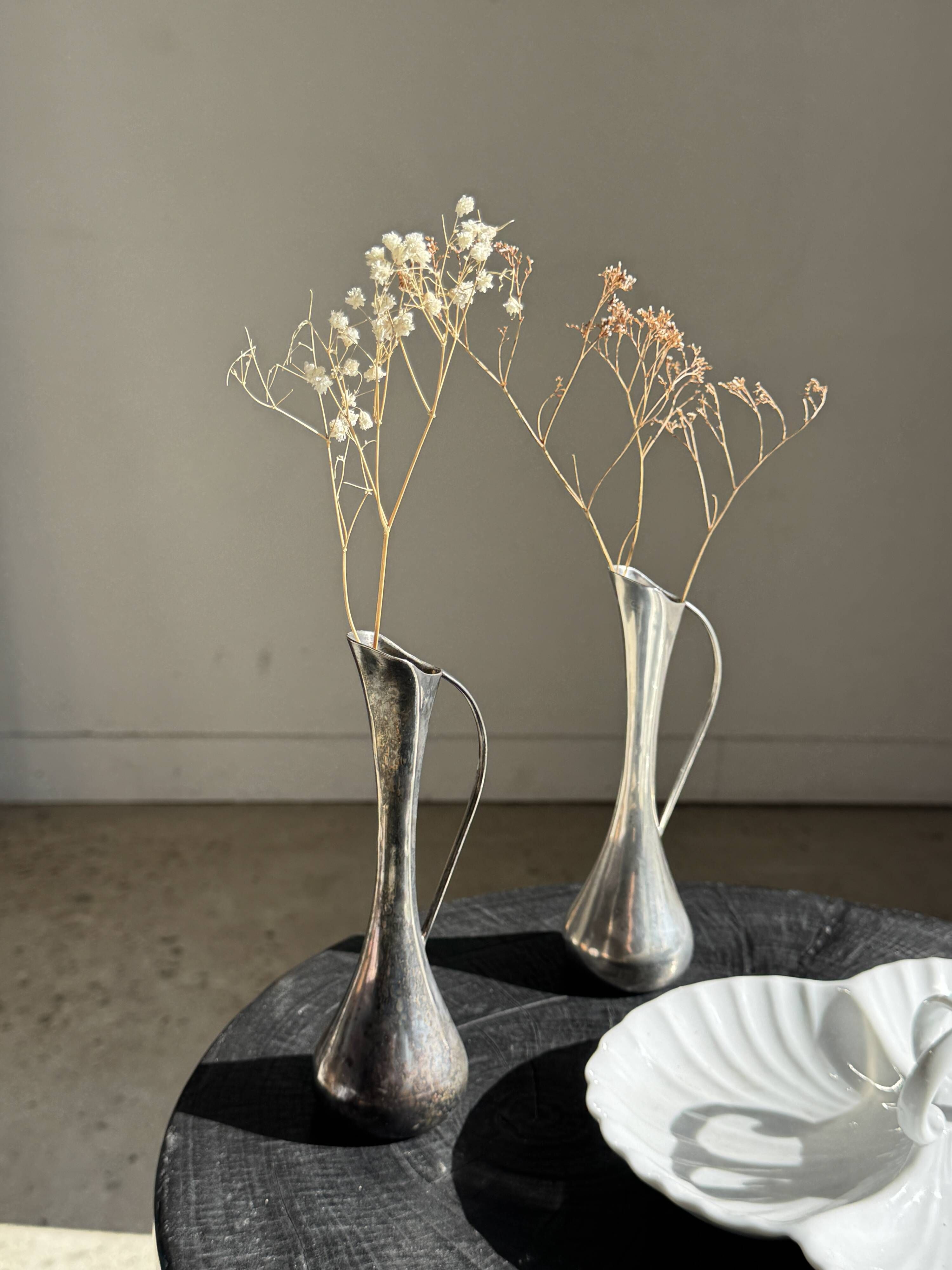 Vintage silver-plated soliflore vase with a dark patina in the shape of a ewer.