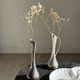 Vintage silver-plated soliflore vase with a dark patina in the shape of a ewer.