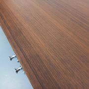 Vintage modernist enfilade in rosewood and chrome metal from the 60s and 70s.