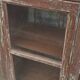 Armoire ancienne vitrée en bois avec fond métal