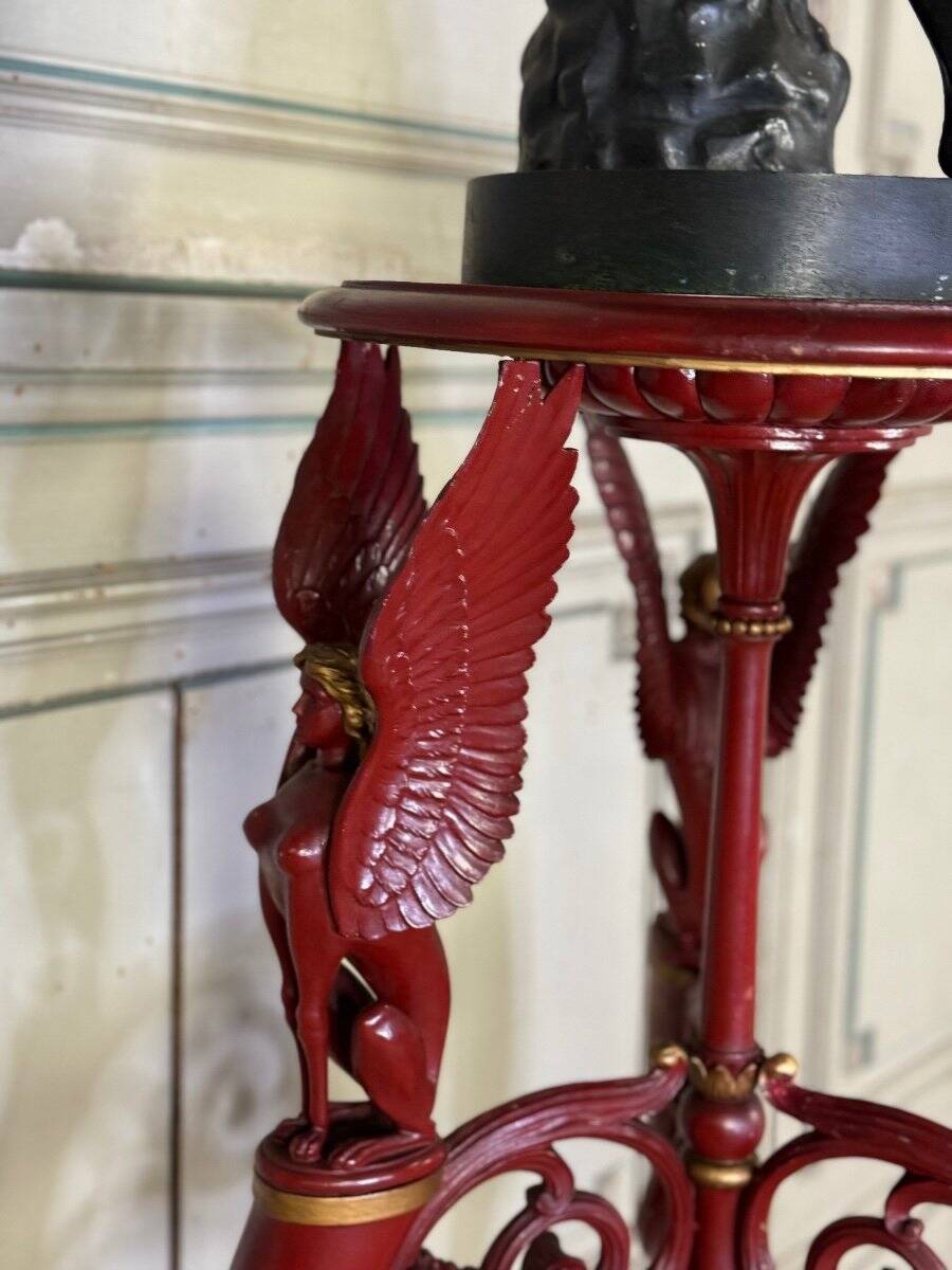 Athenian carved wood, red patina imitation of red marble