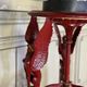 Athenian carved wood, red patina imitation of red marble