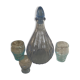 Liquor service consisting of a blue glass decanter and. 3 small antique glasses
