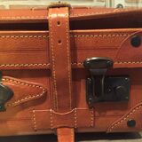 Thick leather suitcase