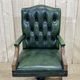 English chesterfield office armchair in green leather from the 1980s