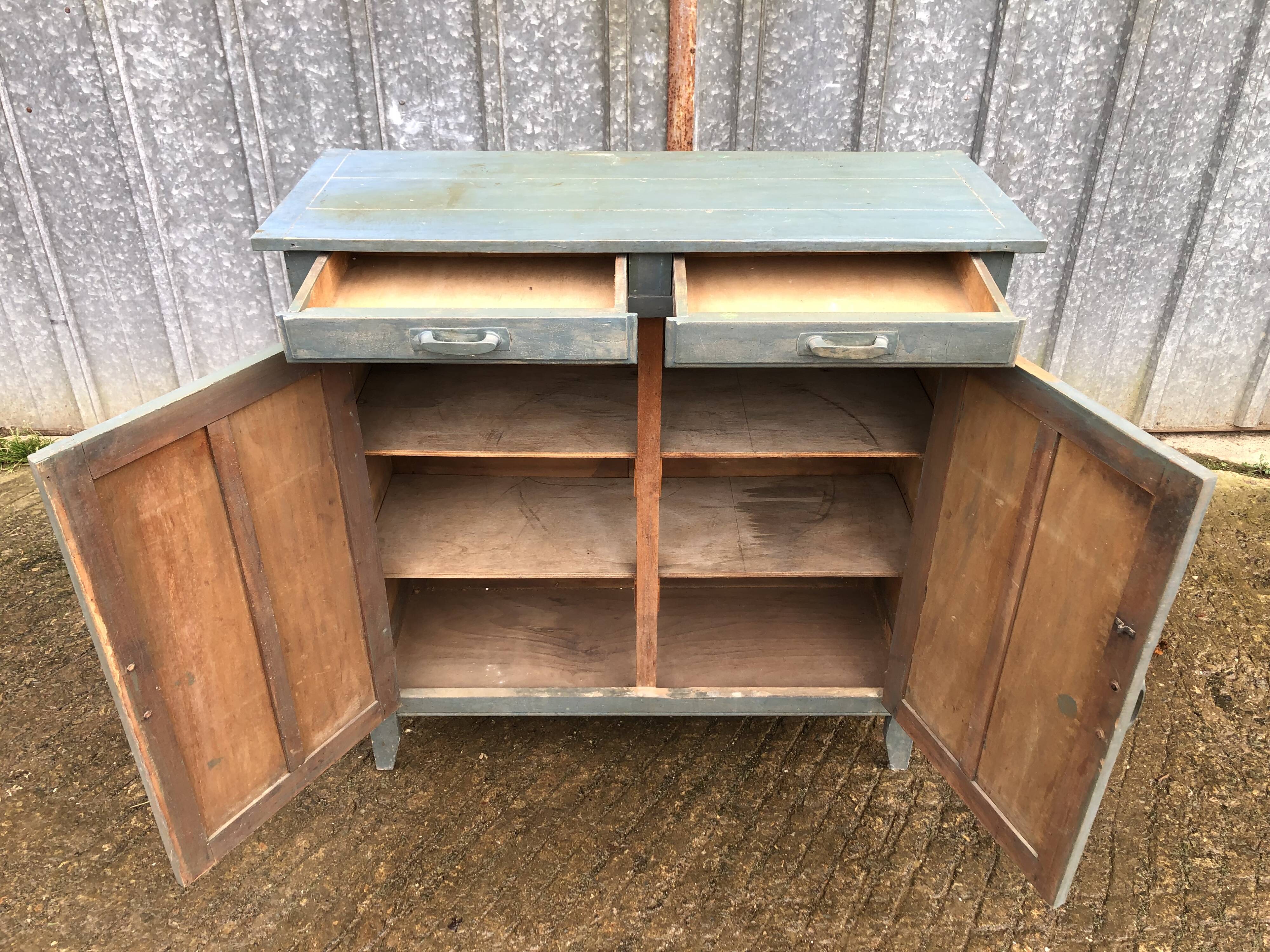 Parisian sideboard painted in blue with 2 doors and 2 drawers.