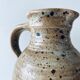 Pitcher in sandstone pyrity signed