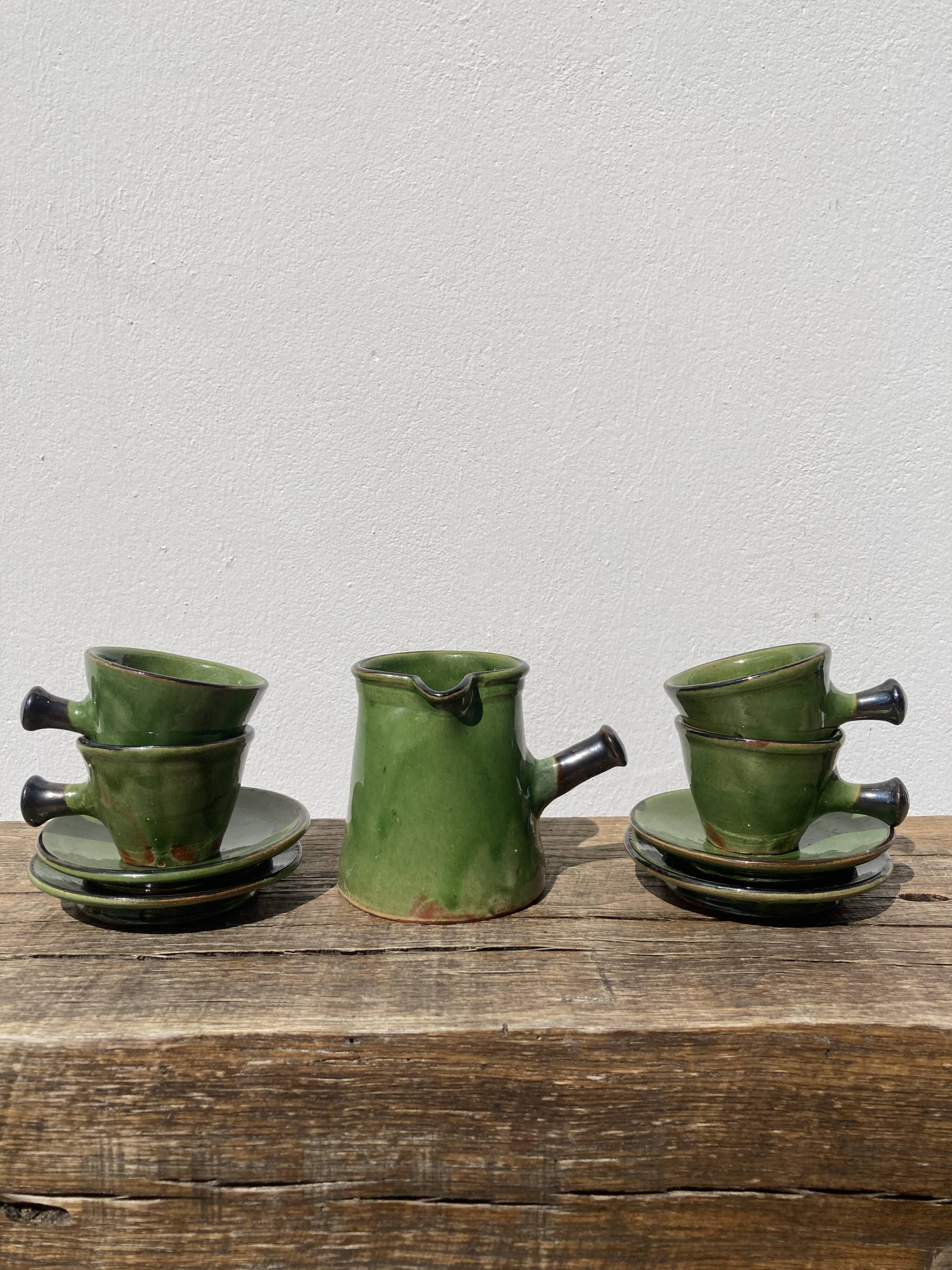 Coffee service signed Poterie de Marnaz including cups and pitcher in glazed terracotta