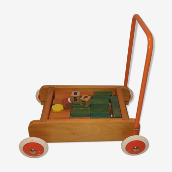 Educational game wood cubes on wheeled cart