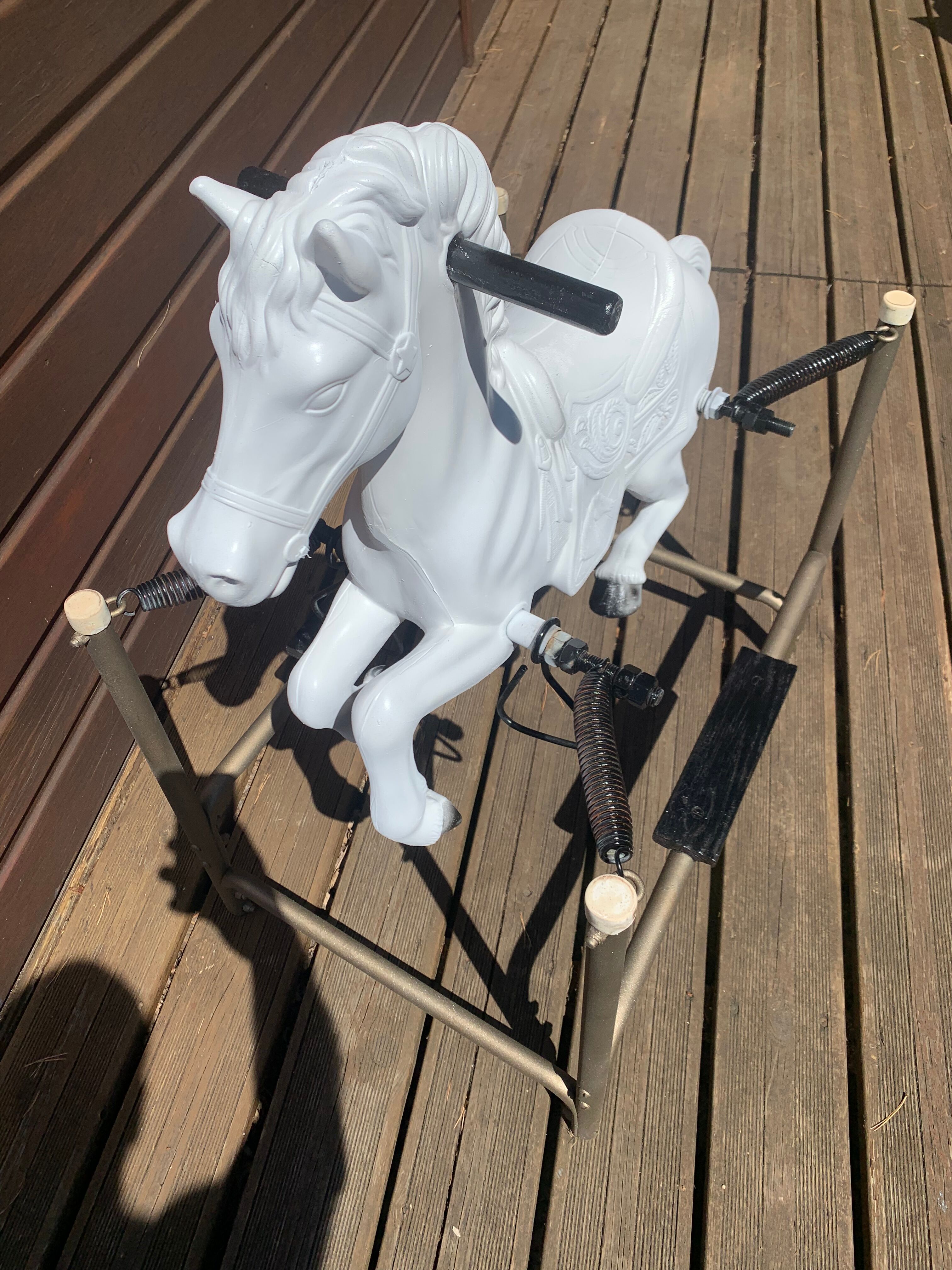 Horse carousel with ressors, 50s