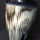 Ceramic vase glazed with two triangular handles