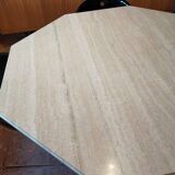 Octagonal dining table in travertine
