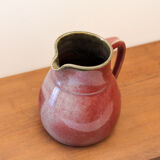 Signed enamelled ceramic pitcher