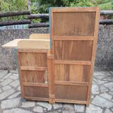 Asymmetrical changing table cabinet