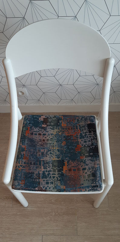 White Baumann chair.