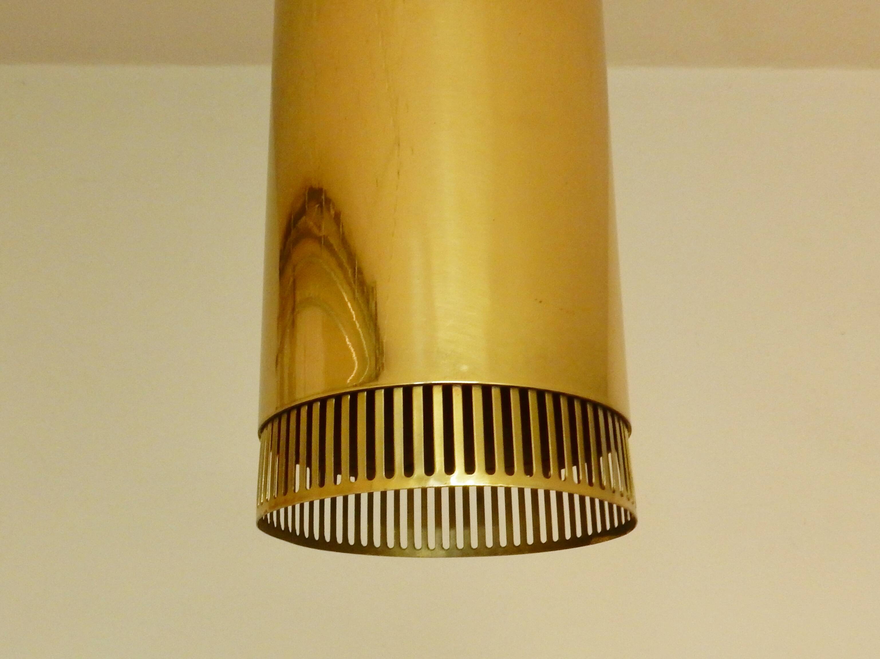 Set of 3 perforated brass cylindrical pendant lamps, Sweden 1960's