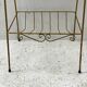 Gold metal and black glass side table