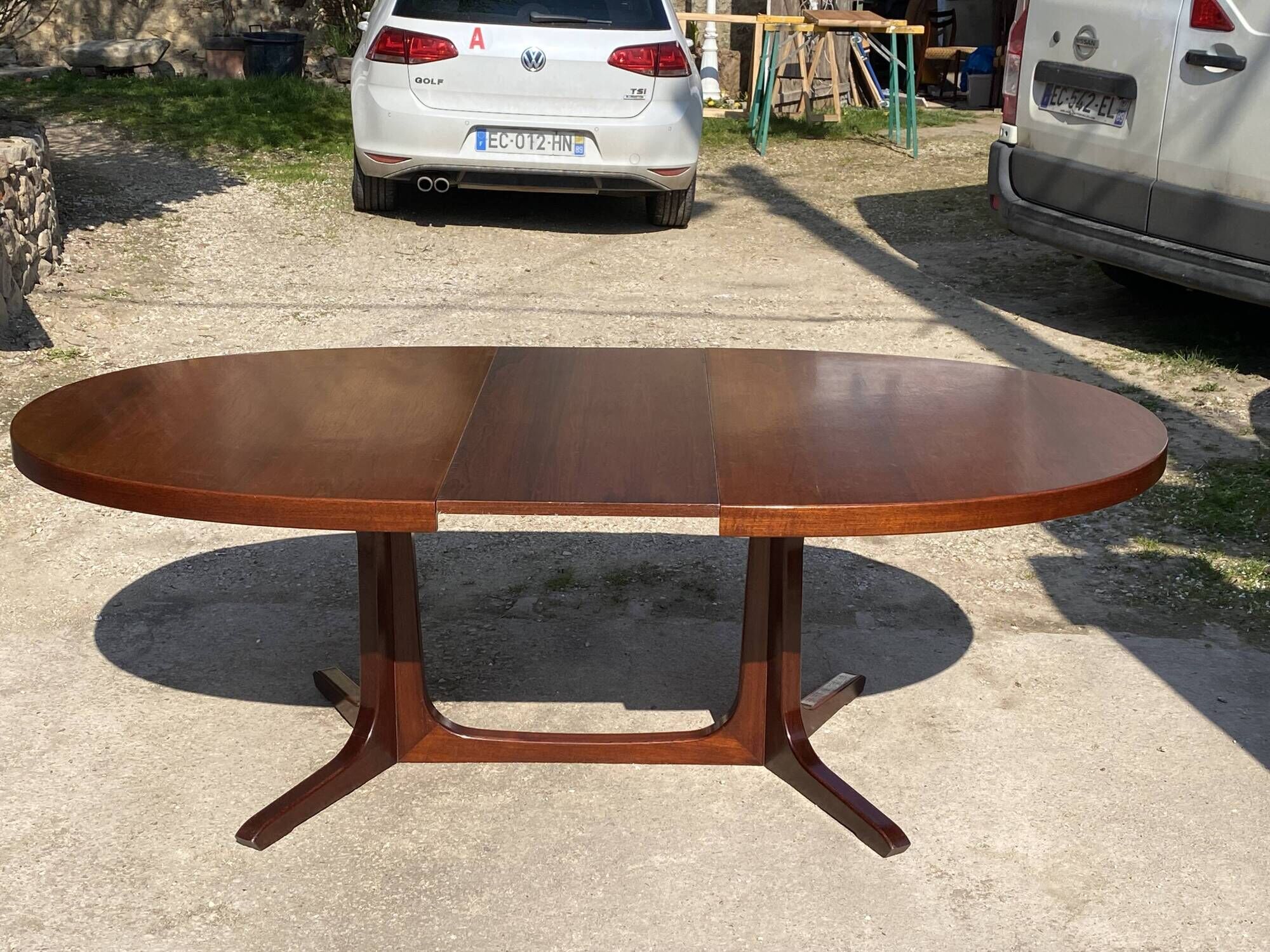 Baumann round oval extendable Scandinavian table in rosewood with 2 extensions.