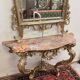 Important console table with a curved shape + Louis XV style mirror in gilded and silvered wood.