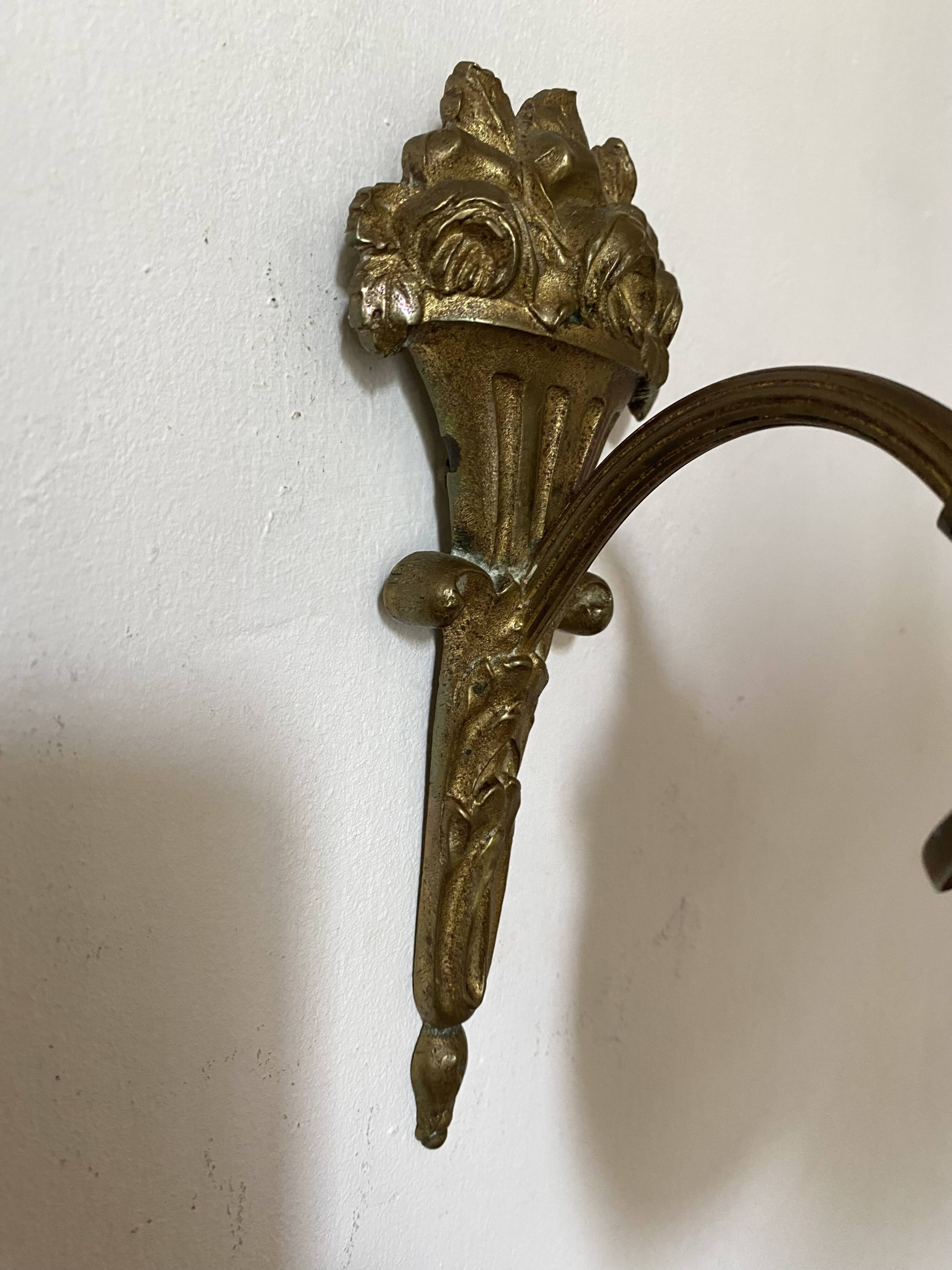 Antique bronze and glass paste wall light