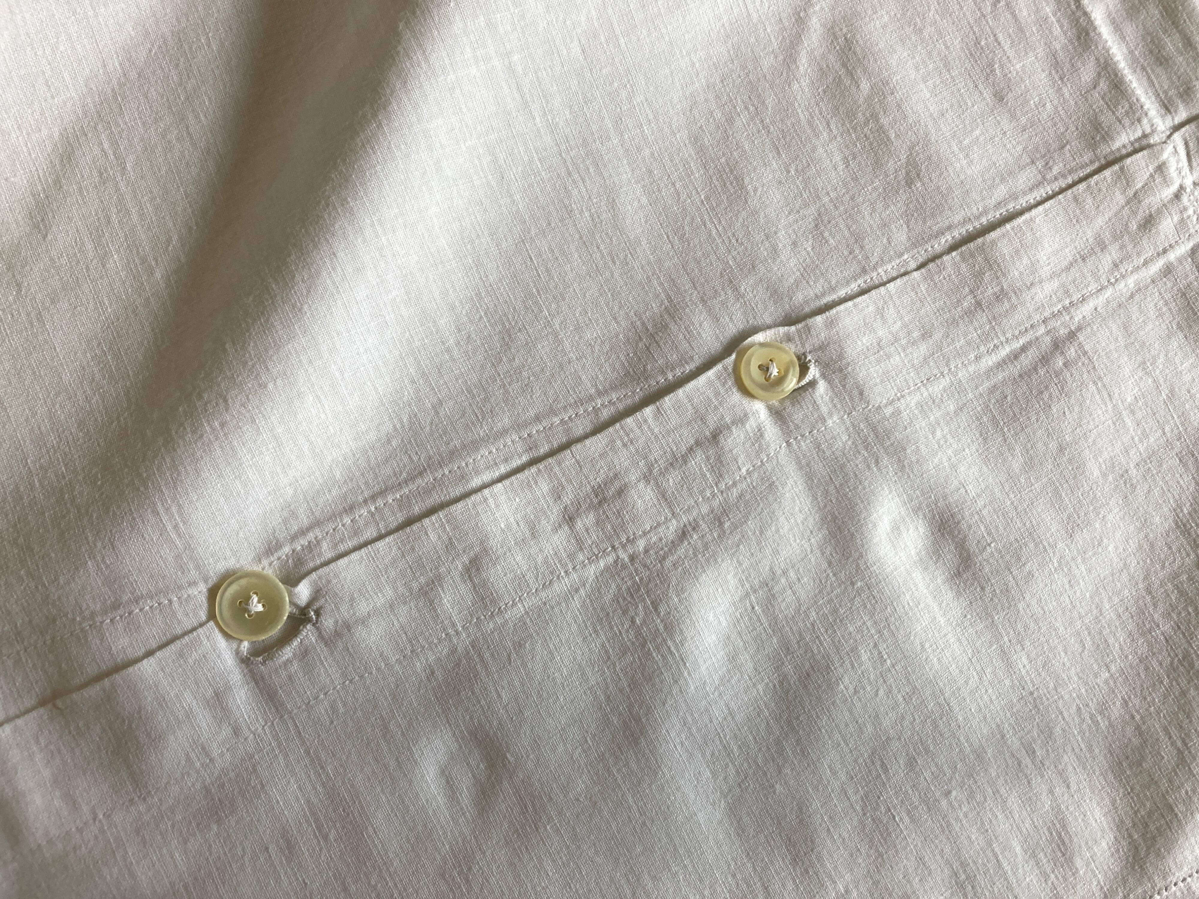 Pair of percale pillowcases embroidered festoons and daisies 1960