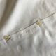 Pair of percale pillowcases embroidered festoons and daisies 1960
