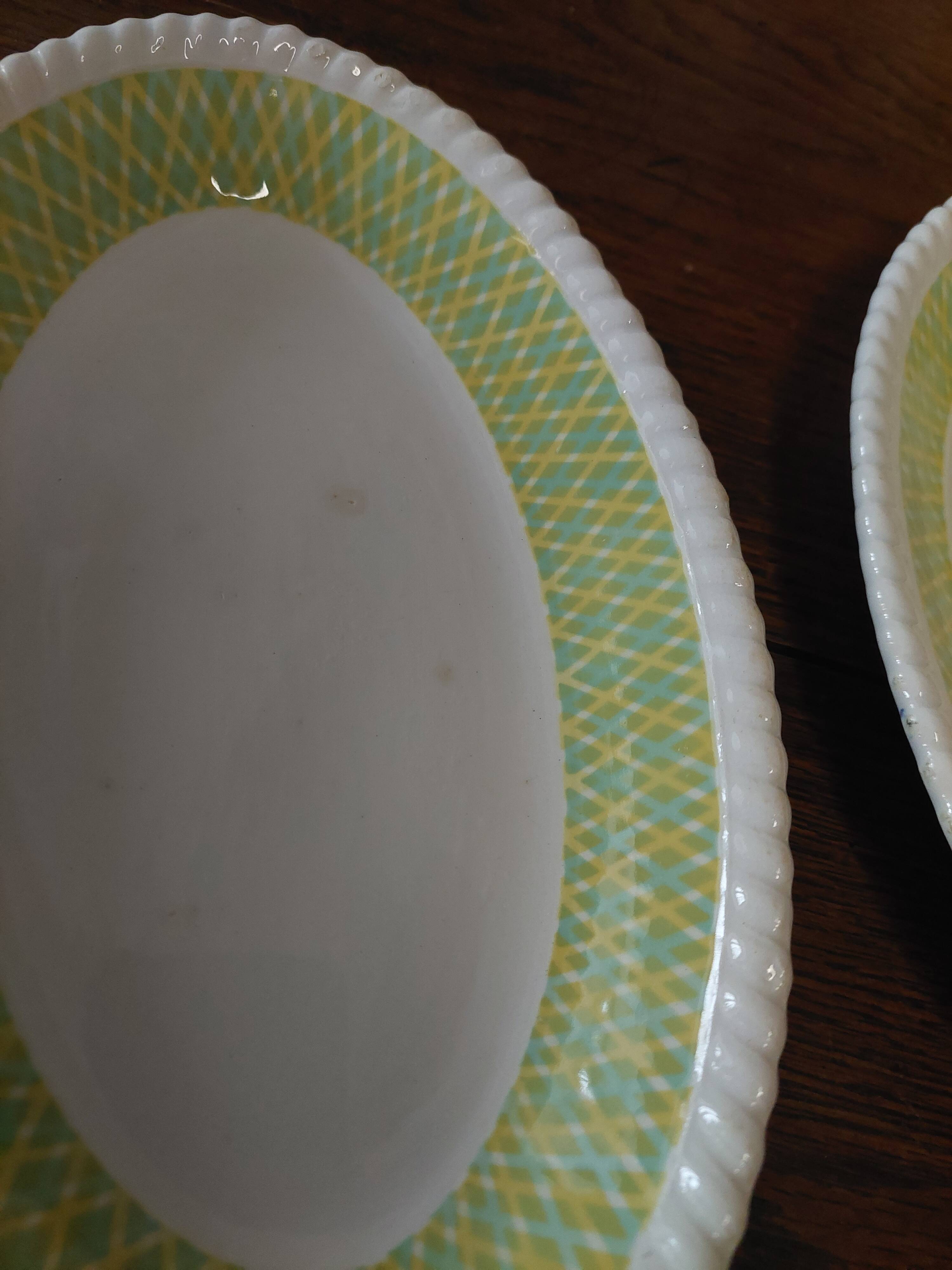 Pair of Badonviller iron earthenware dishes, Amina model