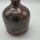 Vase bottle in sandstone pyrity