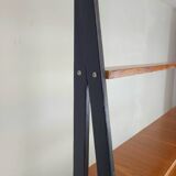 Vintage 1960s Scandinavian teak bookcase with compass legs