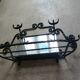 Twisted wrought iron wall-mounted coat rack