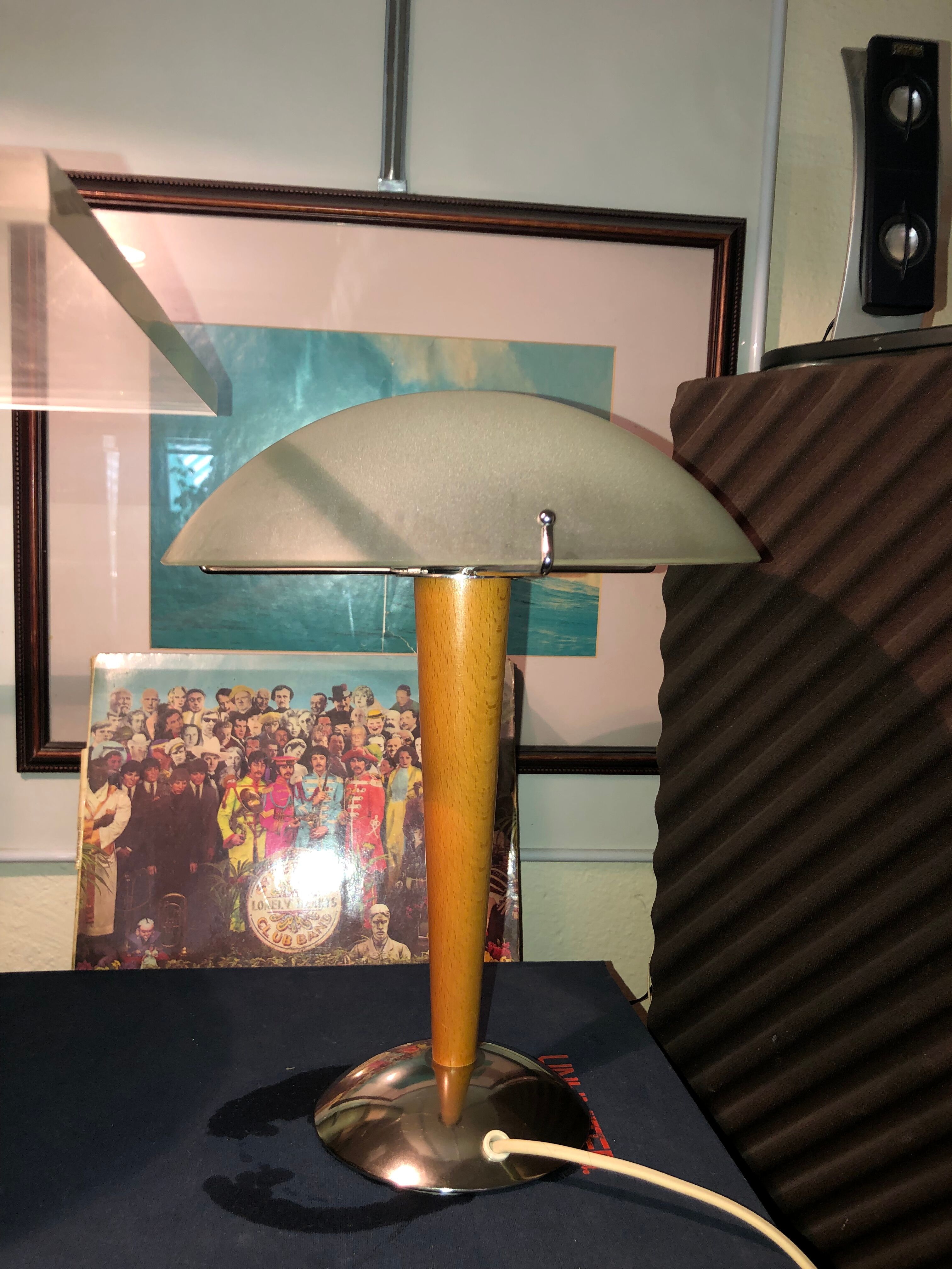 Table lamp legs chrome wood lampshade opaque glass.