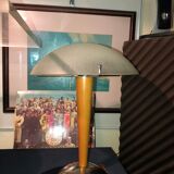Table lamp legs chrome wood lampshade opaque glass.