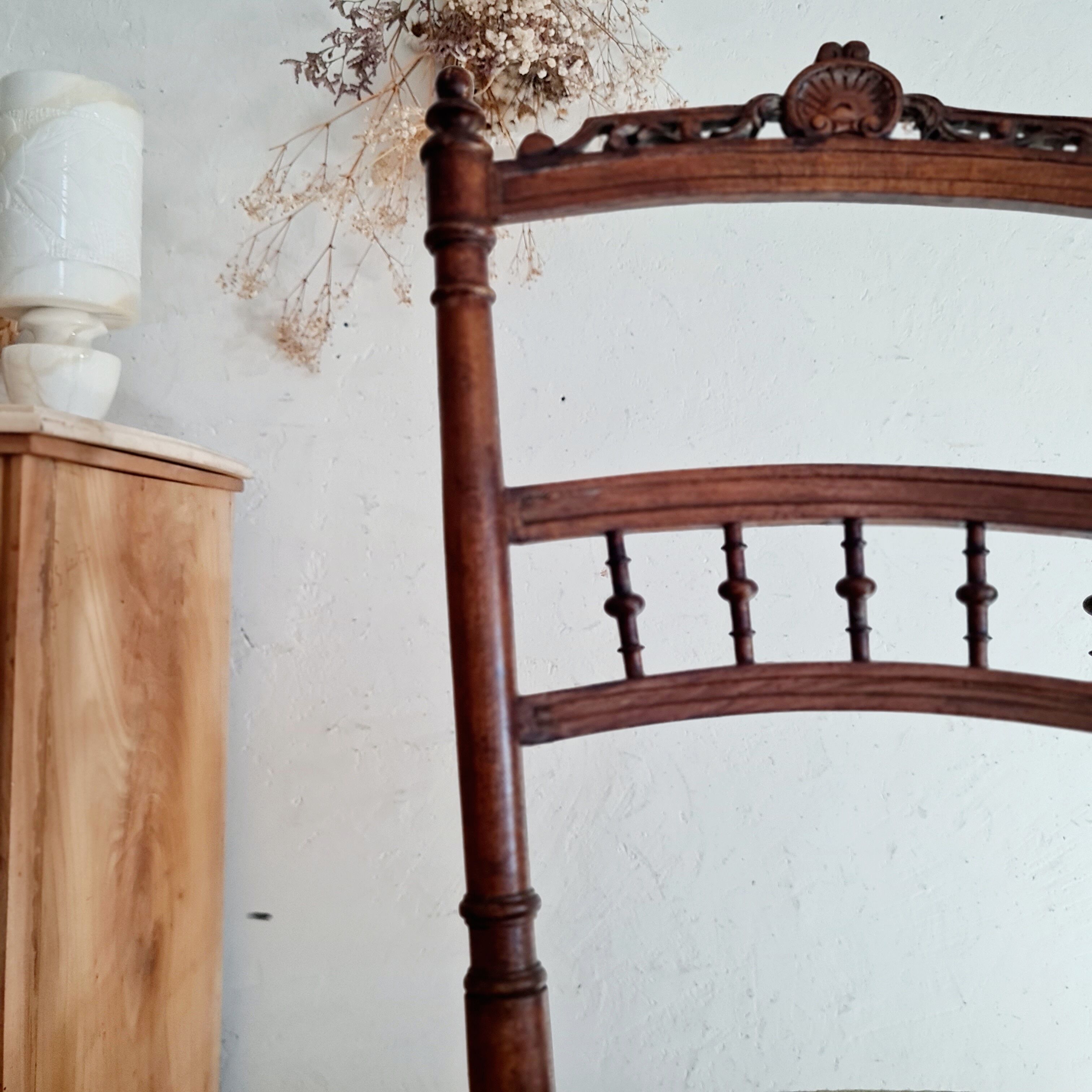 Antique chair turned wood sitting velvet flowers