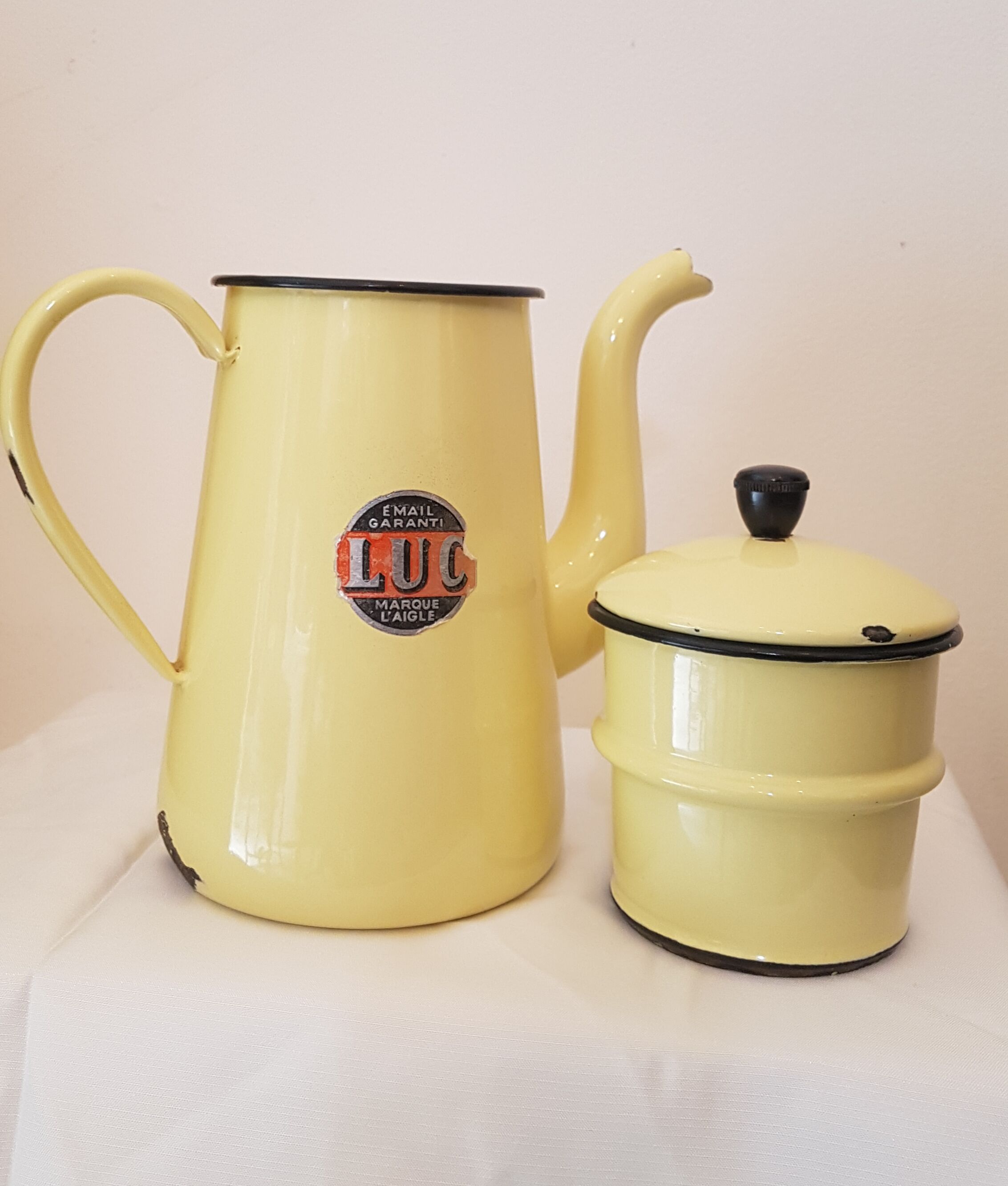 Old pale yellow enamelled coffee maker