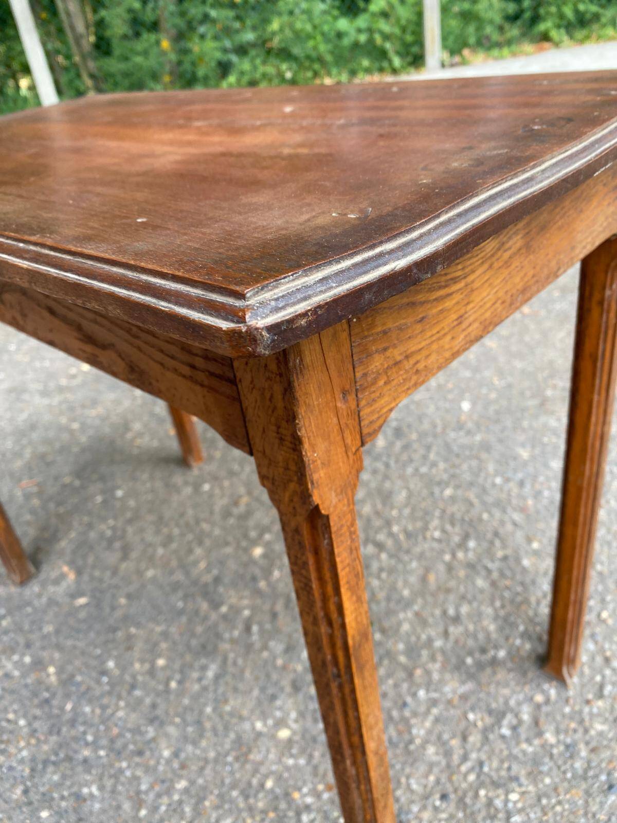 Vintage rectangular side table in solid oak from the 1920s.