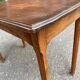 Vintage rectangular side table in solid oak from the 1920s.