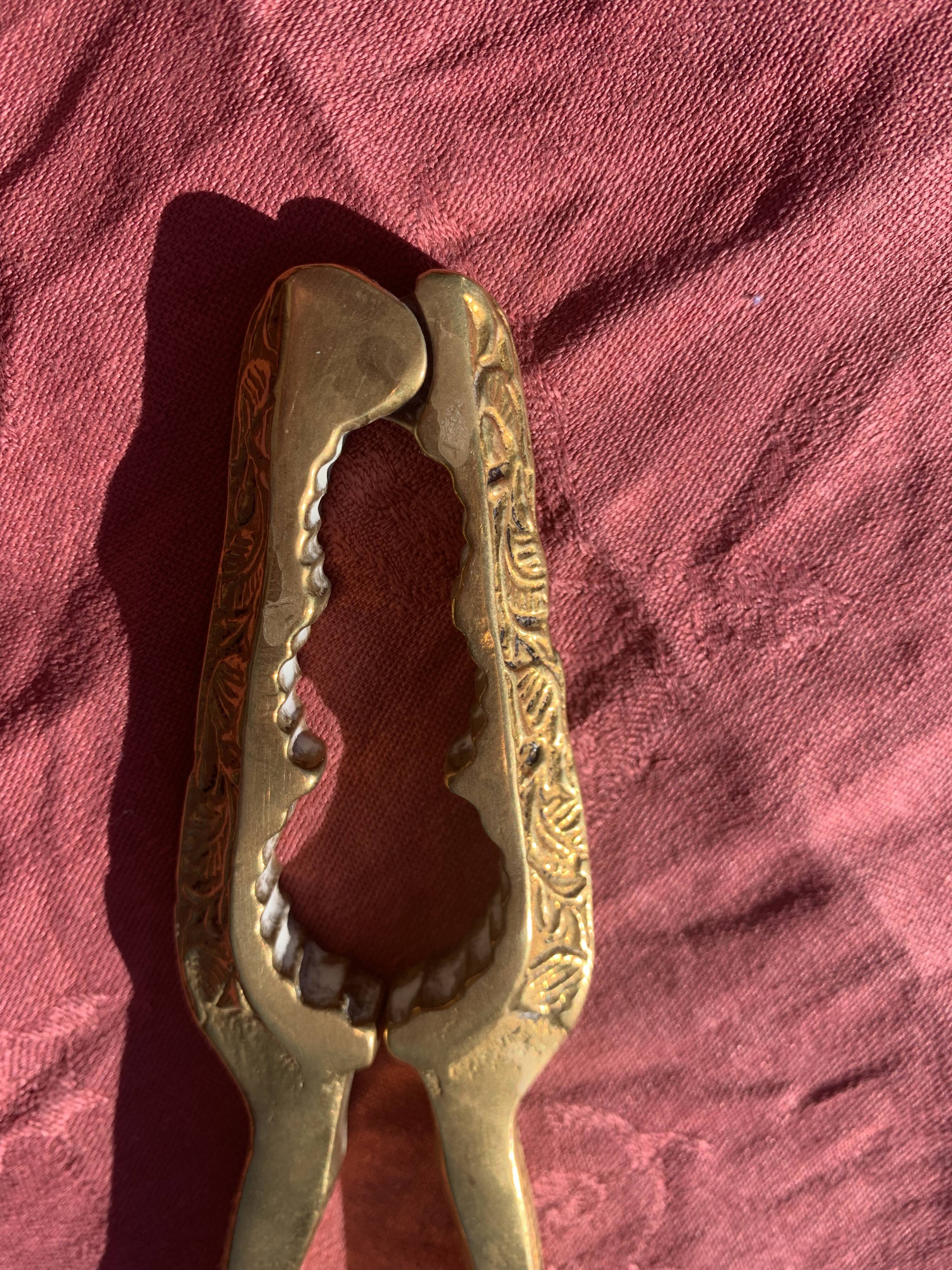 Nutcracker, vintage chiseled golden brass