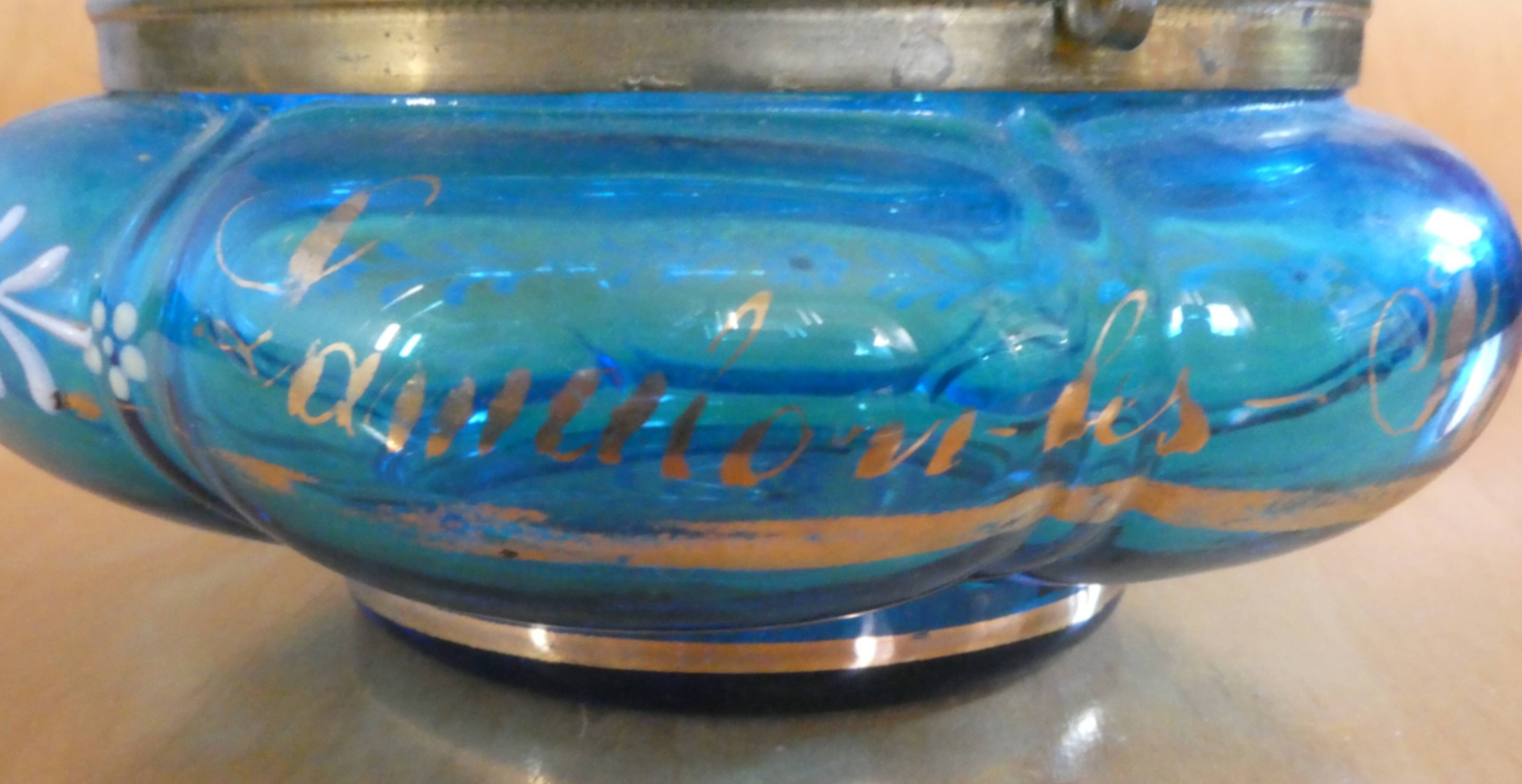 Turquoise glass box, beautifully decorated with gold motifs