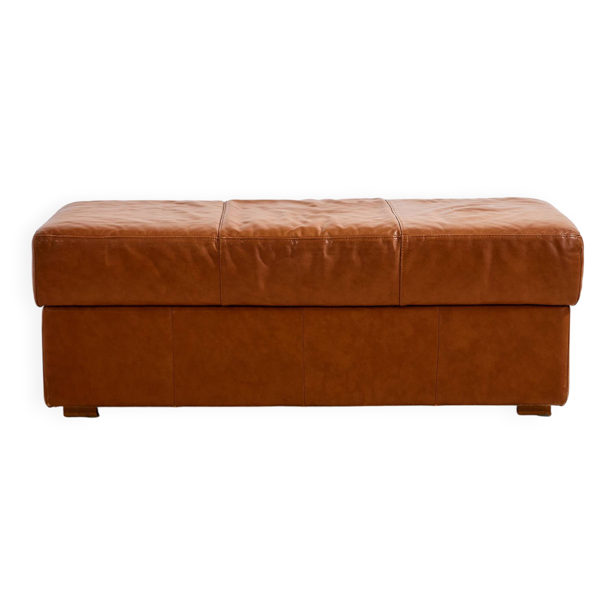 Ottoman with leather upholstery