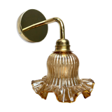 Gold bent wall light vintage tulip in amber glass.