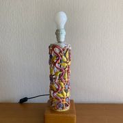 Openwork ceramic lamp base with Garden of Eden decor