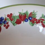 Large ceramic fruit bowl with red fruits